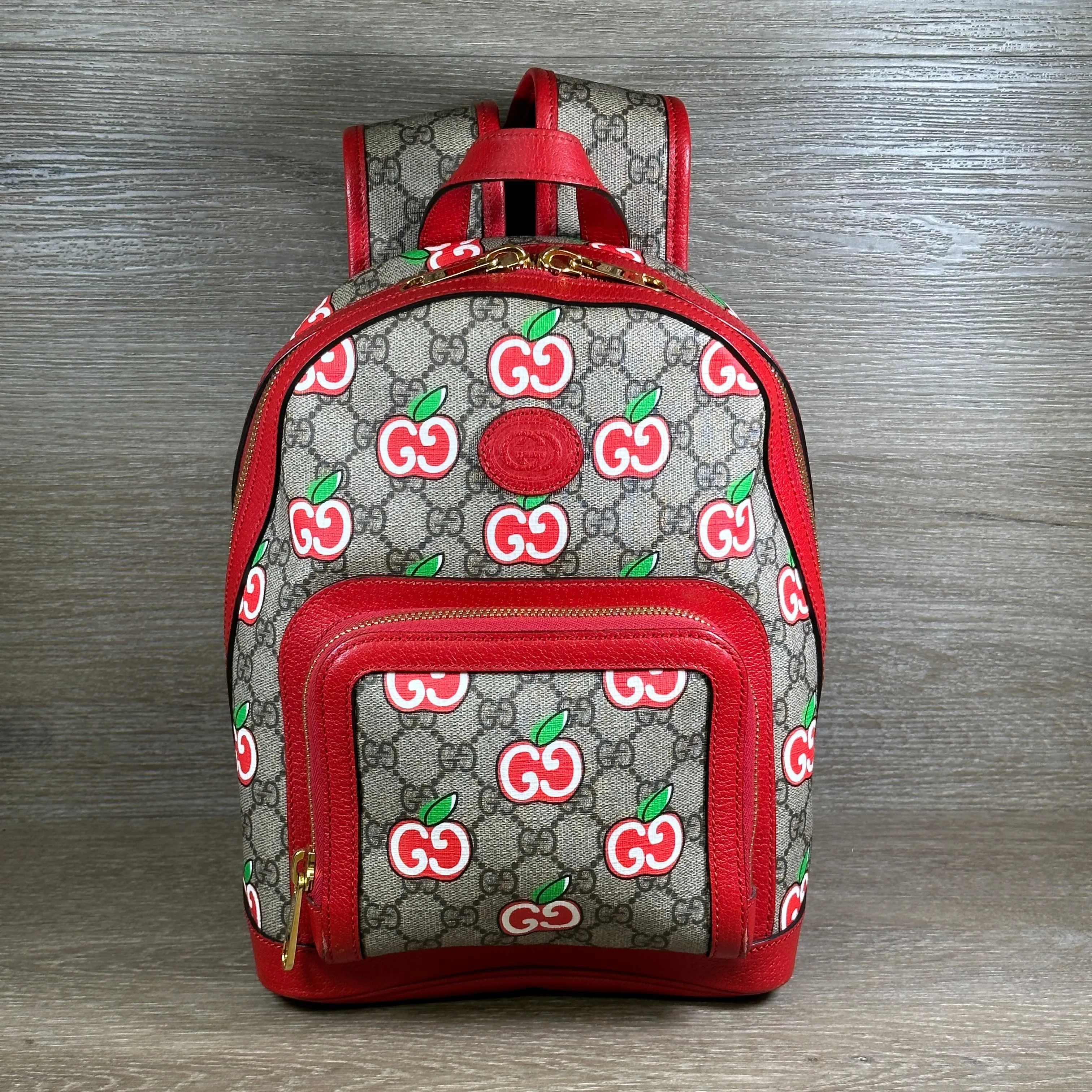 Gucci GG Supreme Canvas Interlocking Apple Backpack