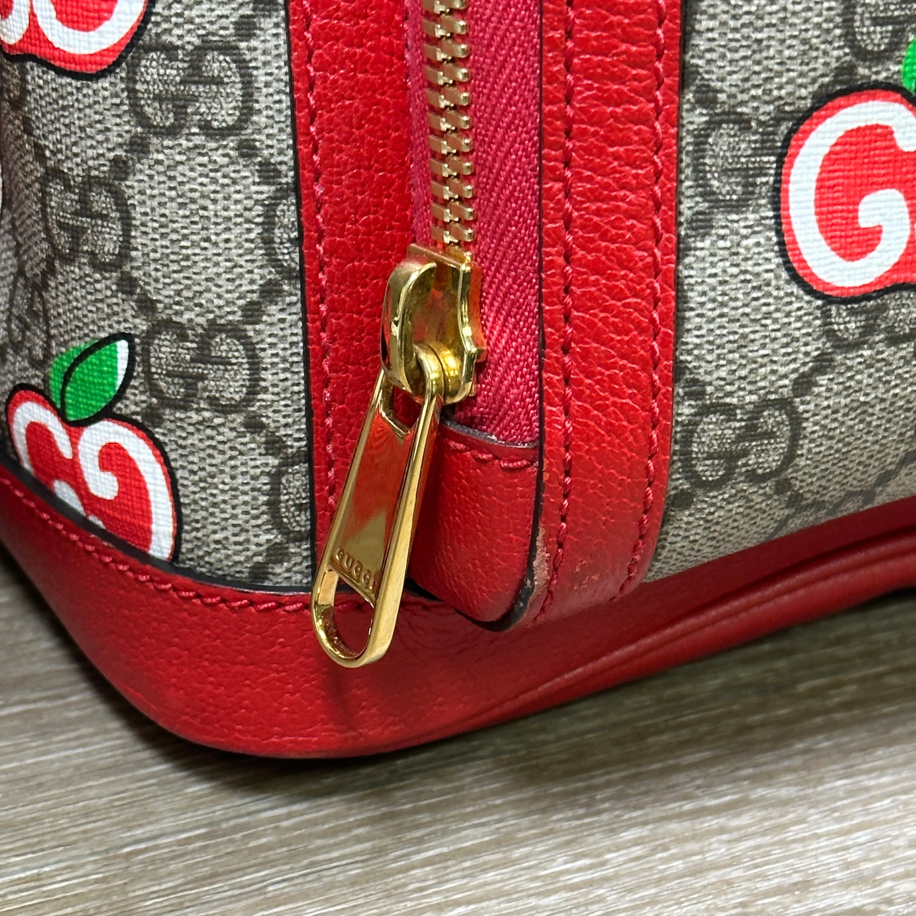 Gucci GG Supreme Canvas Interlocking Apple Backpack