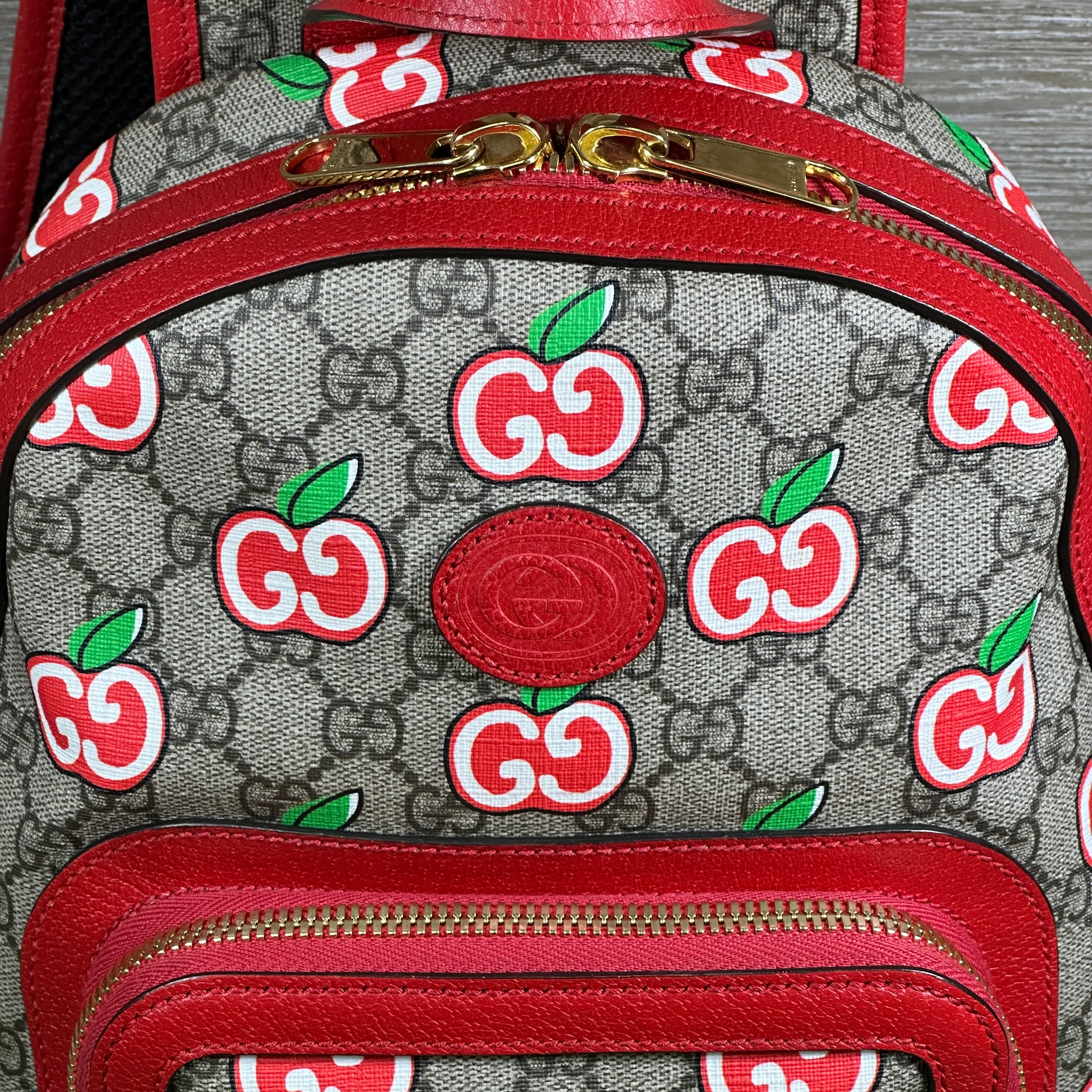 Gucci GG Supreme Canvas Interlocking Apple Backpack